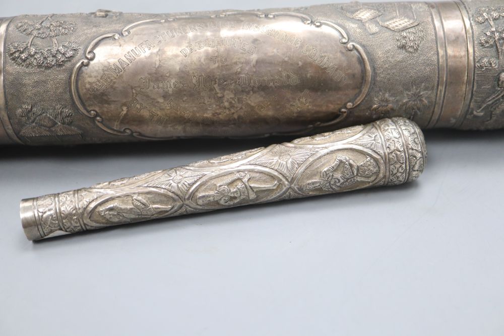 A 20th century Indian white metal scroll holder, 40.4cm and a white metal parasol handle, 16cm